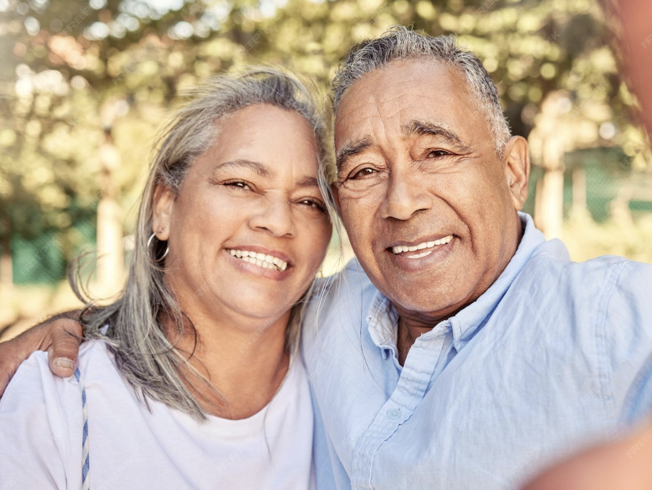 The Ramirez Family smiling together outdoors