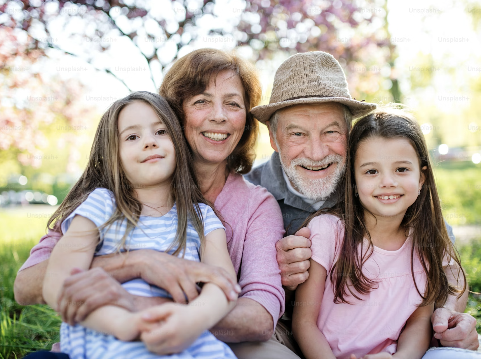 Grandparents with two granddaughters outdoors